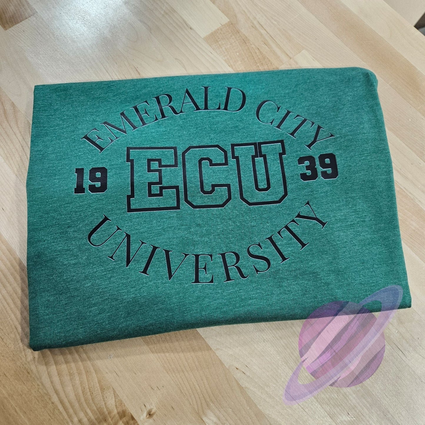 EMERALD CITY U TEE