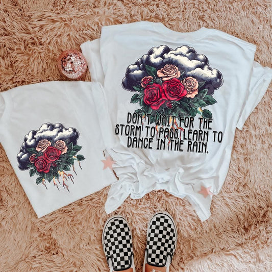 DONT WAIT FOR THE STORM TO PASS - POCKET PRINT DOUBLE SIDED TEE