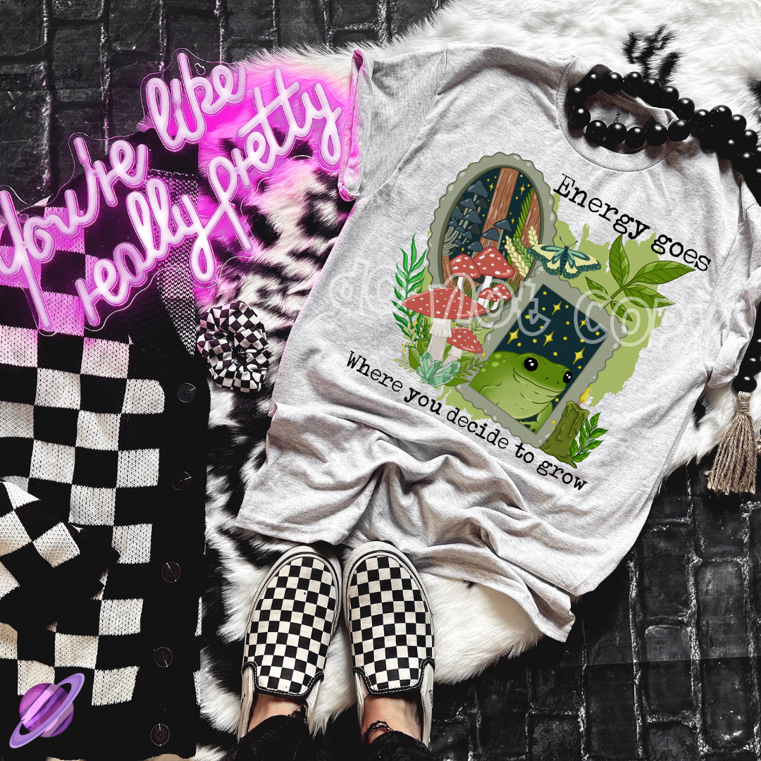 ENERGY GOES WHERE YOU DECIDE TO GROW TEE