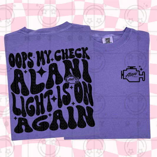 OOPS MY CHECK ALANI LIGHT IS ON DOUBLE SIDED TEE